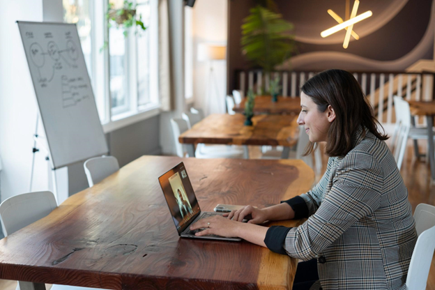 A picture of a woman practicing her interview skills with a Residents Medical professional via video chat on her laptop